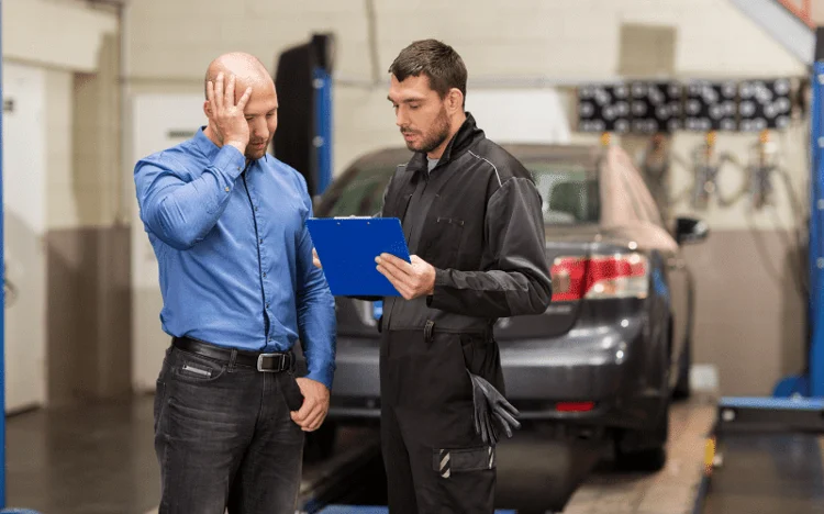 Man frustrated at the Auto Body Shop
